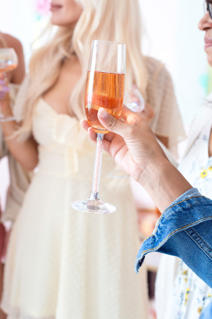 toasting champagne at an event 